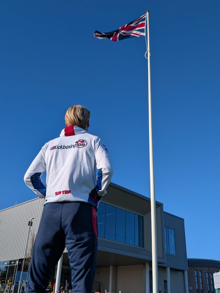 Liam kickboxer with flag